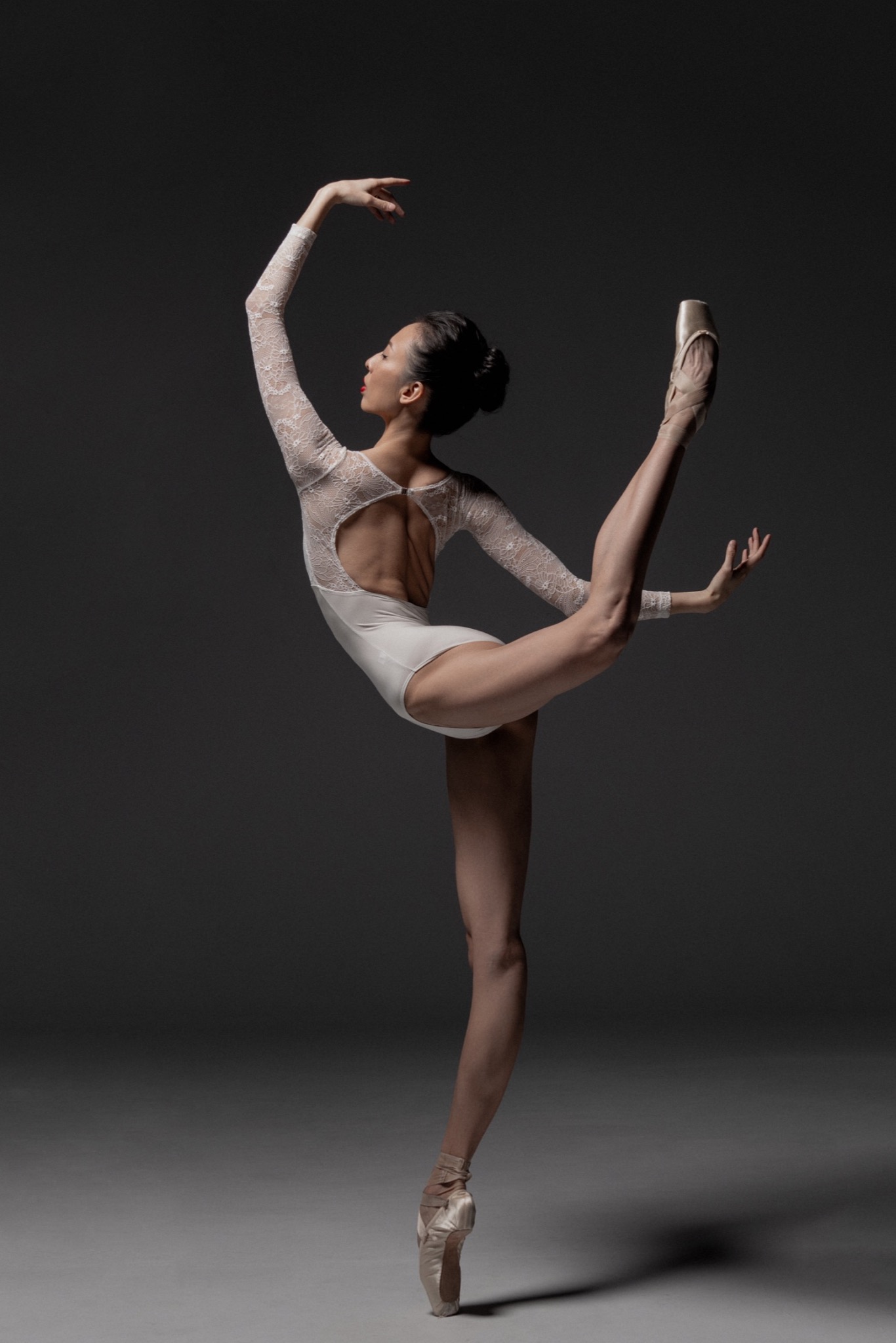 Mi Deng in a studio ballet portrait, photographed from the back