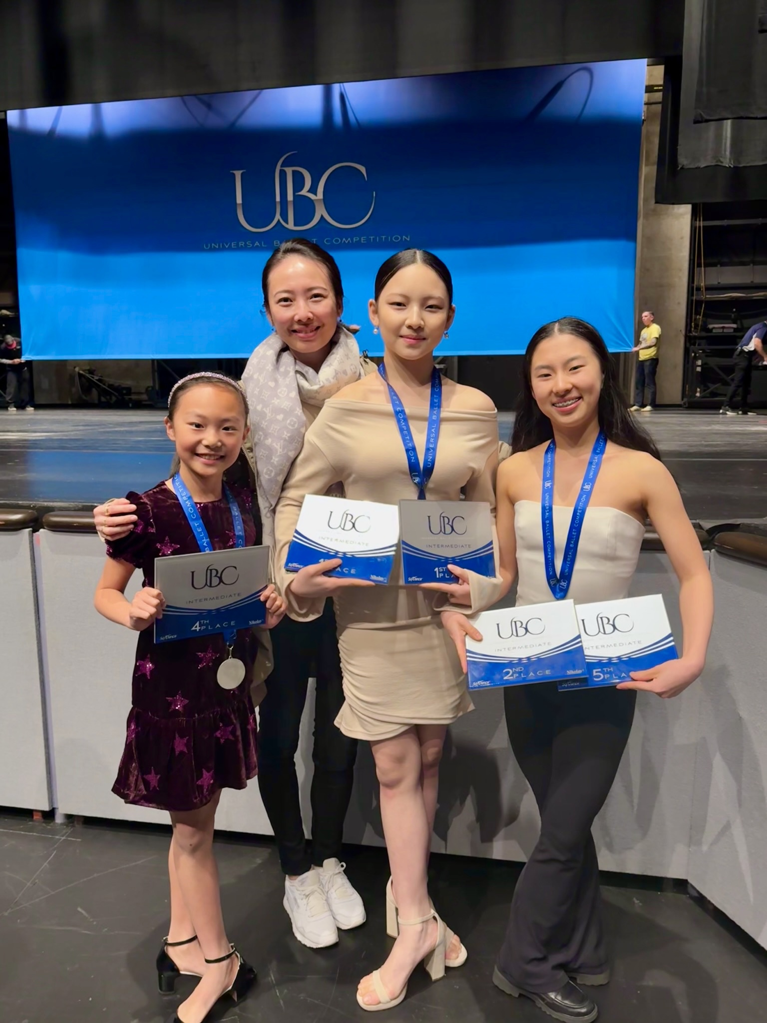 Mi Deng with students at Universal Ballet Competition